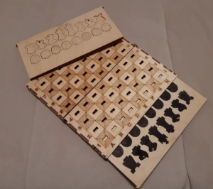 Wooden travel chess. Laser cutting.